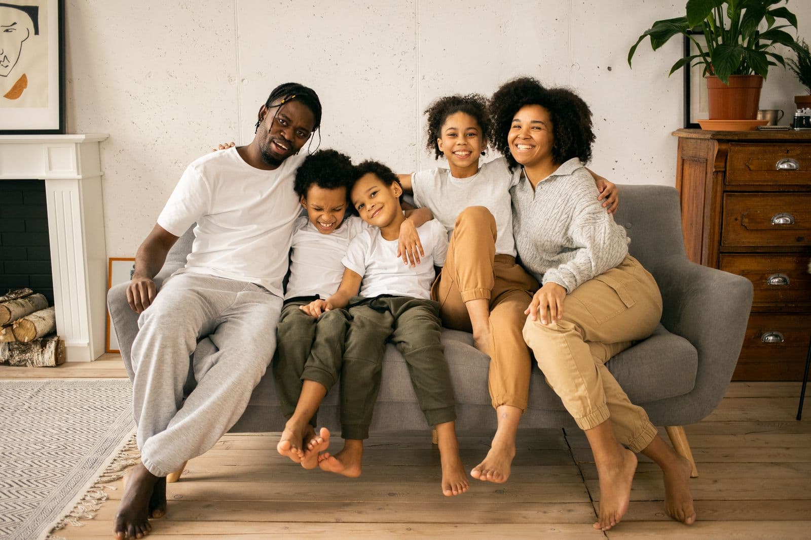A family relaxing together on the couch at home